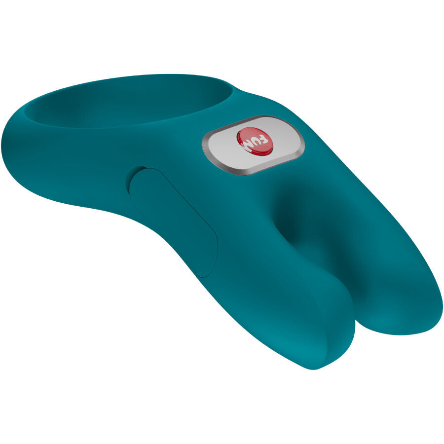 Cockring NŌS vert de Fun Factory couché, bouton de commande et bras flexibles