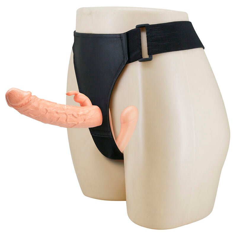 Gode ceinture double Charlotte Baile porté sur un buste mannequin, harnais noir